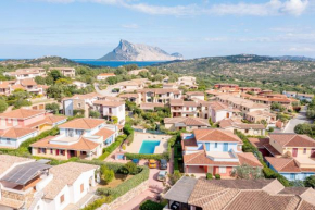 ISA-Residence with swimming-pool in Cala Girgolu, apartments with private outdoor area